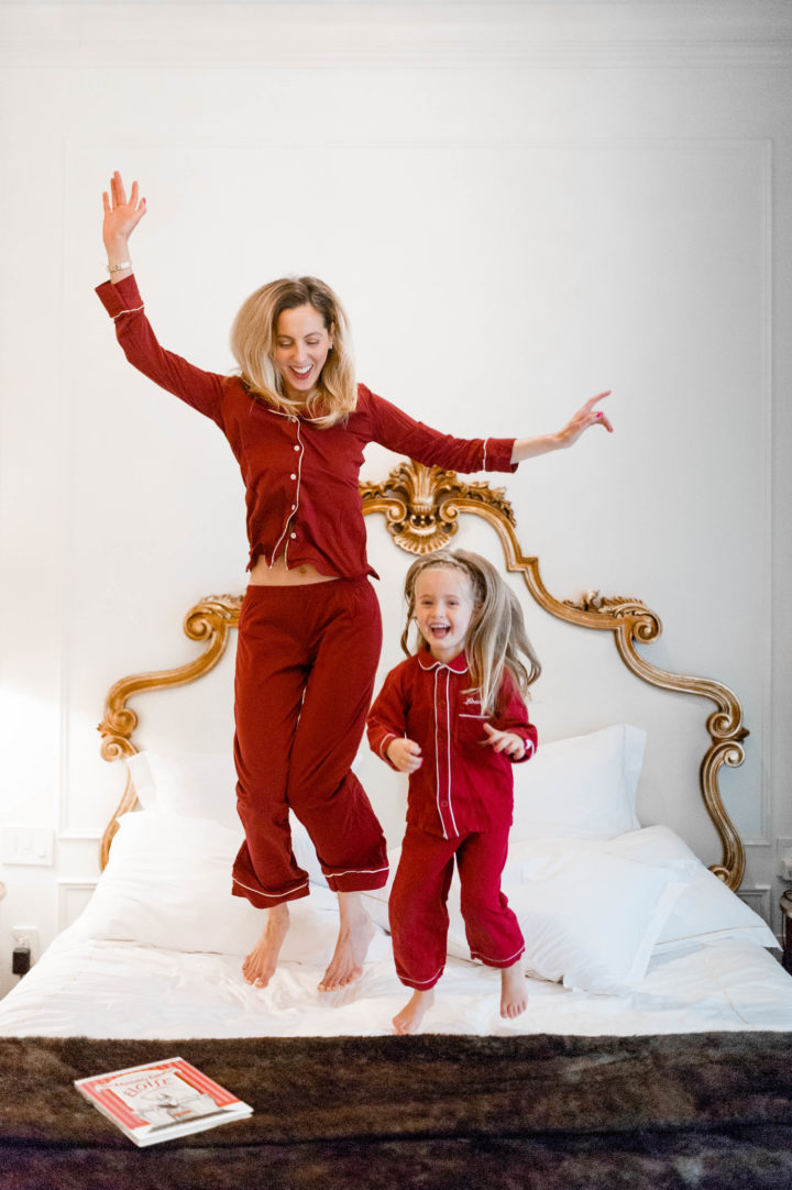 Eva Amurri Martino jumps on the bed at the Plaza Hotel in New York City with her daughter Marlowe