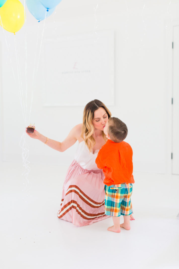 Eva Amurri Martino sweetly kisses her son Major while they both enjoy cupcakes to celebrate the 3rd birthday of her blog Happily Eva After