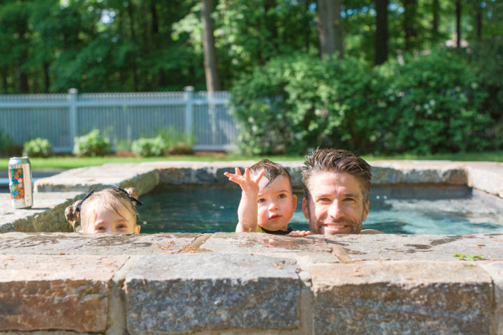 Kyle Martino plays with his daughter Marlowe and son Major in the pool