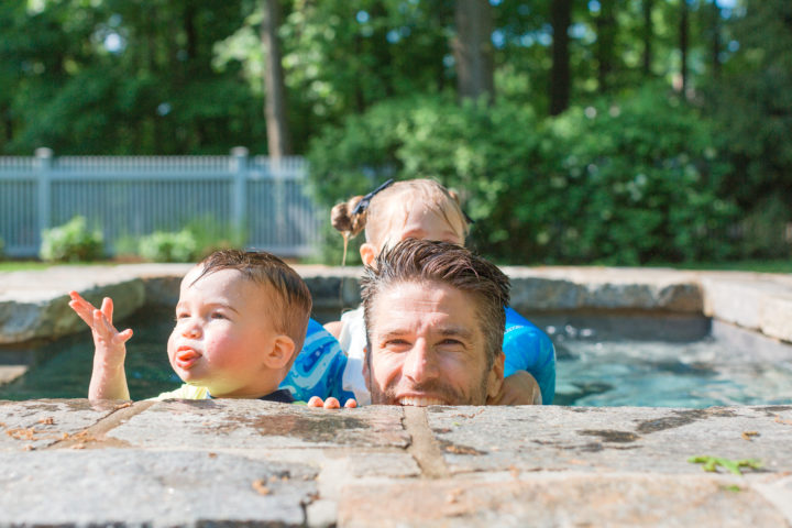Kyle Martino plays with his daughter Marlowe and son Major in the pool