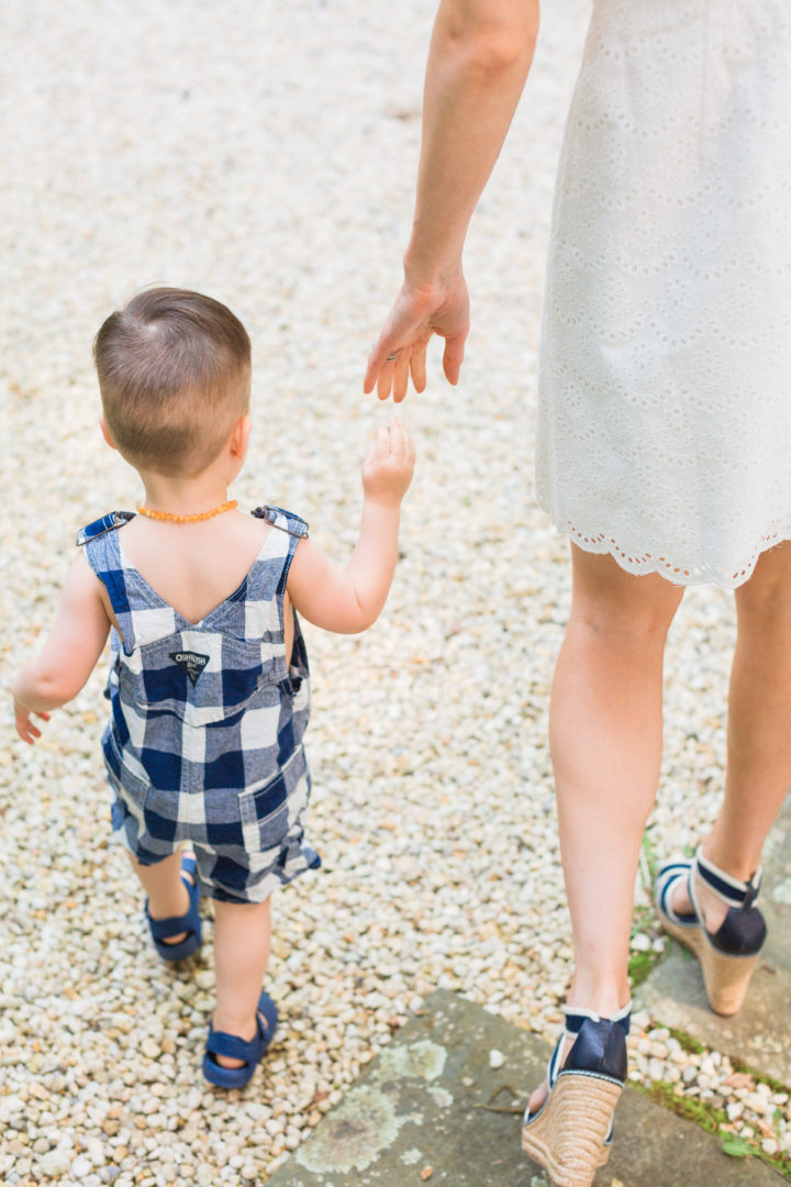 Eva Amurri Martino reaches for her son Major's hand.