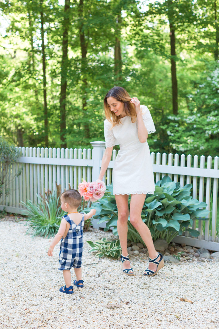 Eva Amurri Martino hands her son Major a flower from their garden in Connecticut.