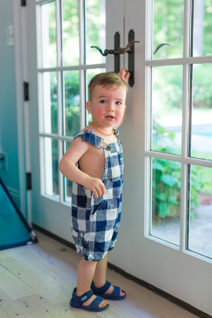 Eva Amurri Martino's son Major poses in gingham overalls in their house in Connecticut.