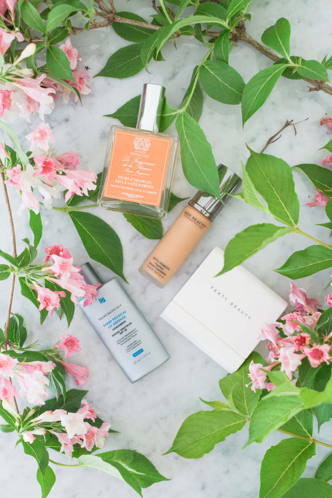 Eva Amurri Martino shares a roundup of her favorite beauty and home products for june, including a room spray, a sunscreen, a foundation and a blotting system