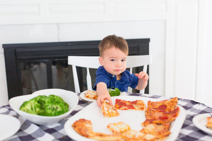 Eva Amurri Martino's son Major reaches for a slice of Red Baron pizza