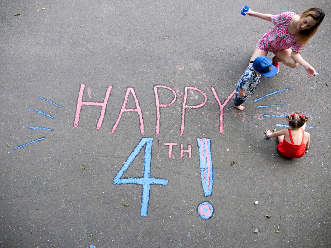 Eva Amurri Martino decorates her driveway for the fourth of july with her children Marlowe and Major