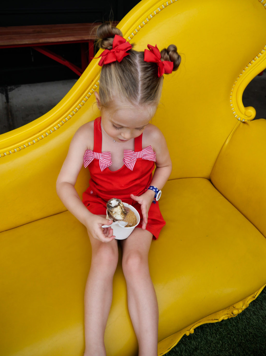 Marlowe martino tucks in to a s'mores sundae at Milkbar in connecticut on the fourth of july