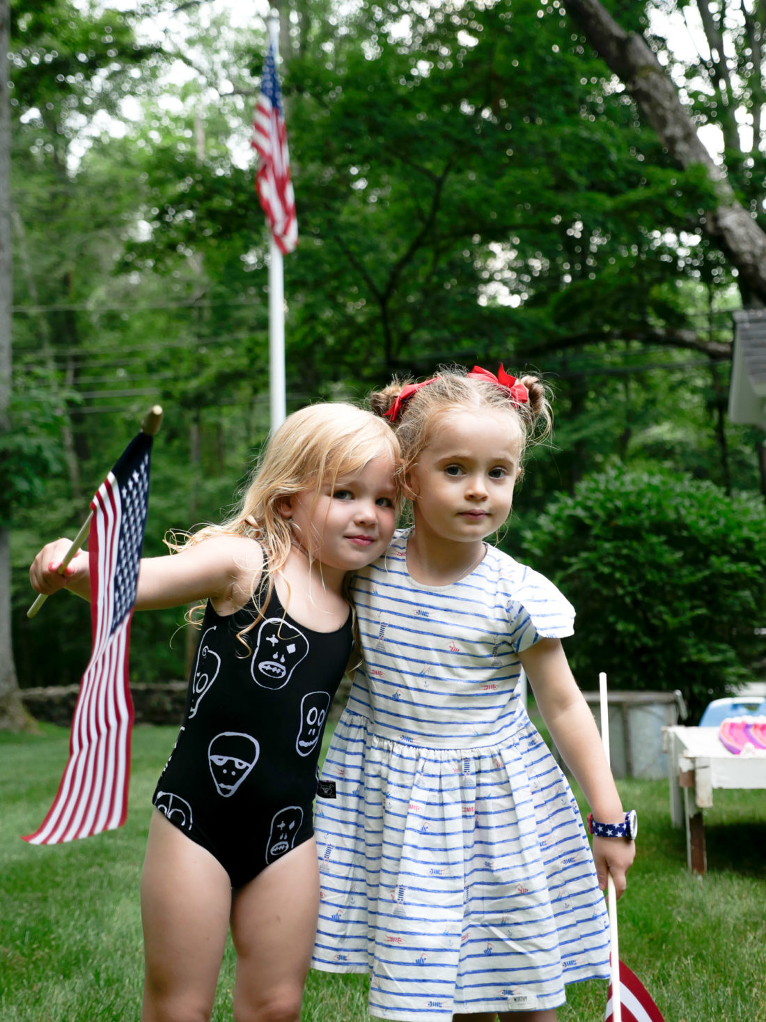 Marlowe Martino poses with a friend at a fourth of july party