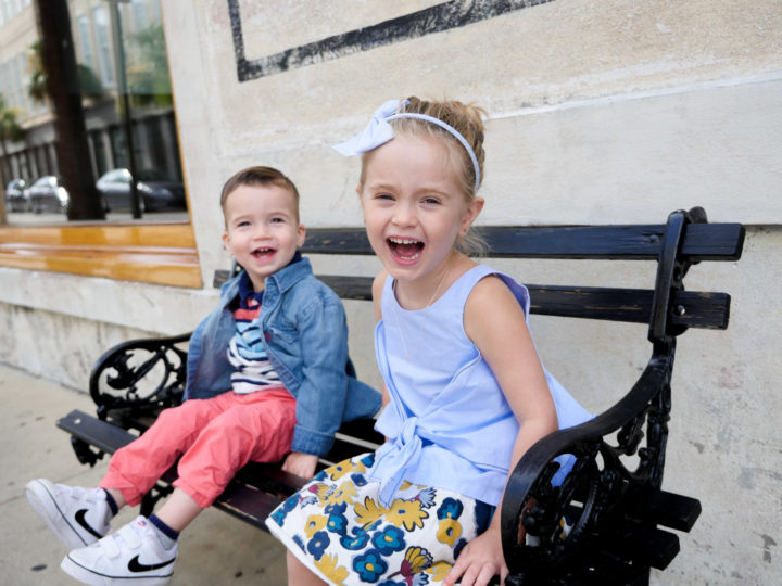 Eva Amurri Martino's kids Marlowe and Major laughing on a park bench in Charleston.