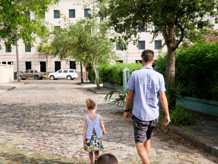 Eva Amurri Martino's husband Kyle and daughter Marlowe walk together through the streets of Charleston