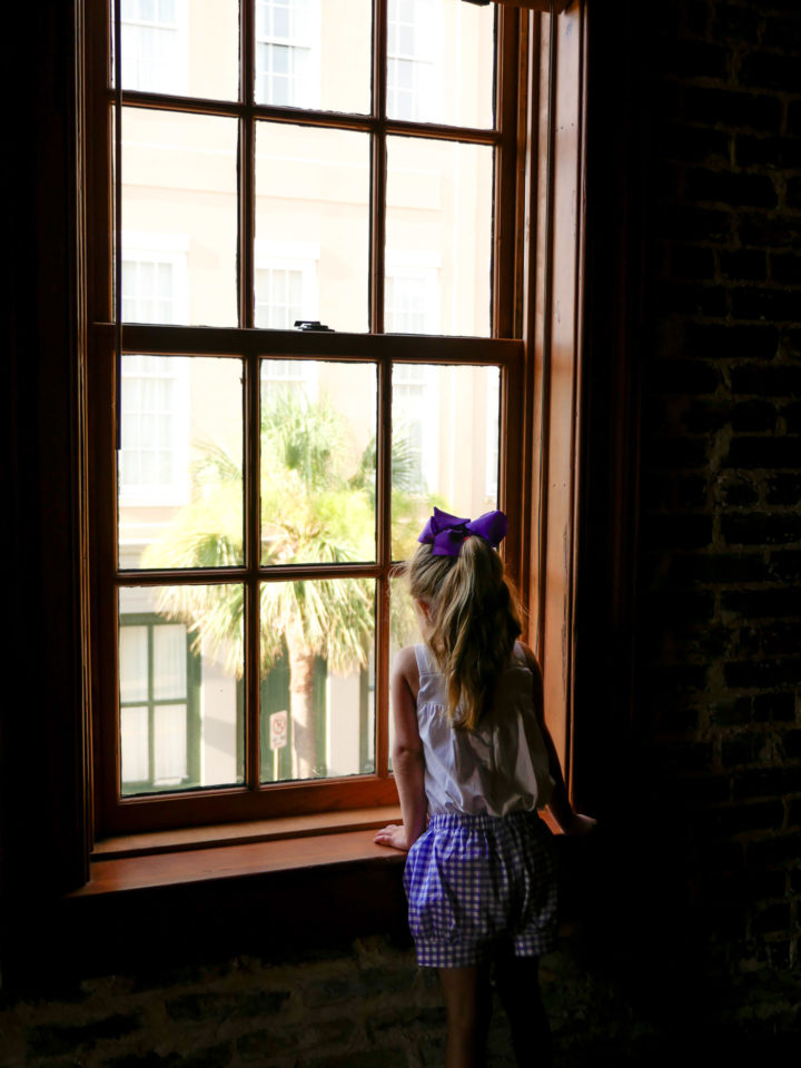 Eva Amurri Martino's daughter Marlowe looks out the window of their Charleston rental home