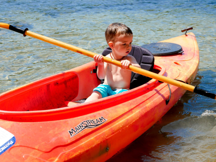 Eva Amurri Martino's son Major sits in a canoe in Bar Harbor, ME.