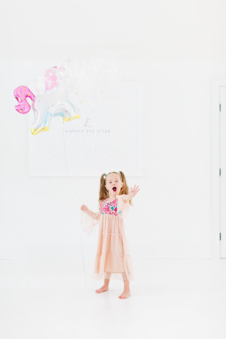 Eva Amurri Martino's daughter Marlowe holds a unicorn balloon for her 4th birthday