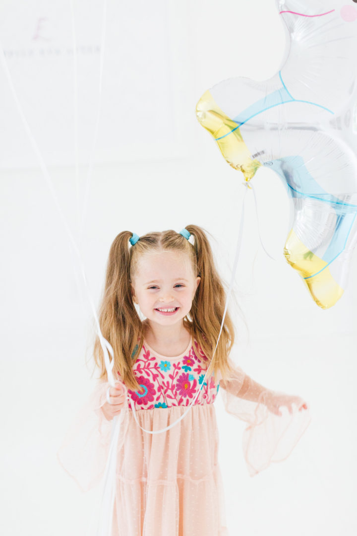 Eva Amurri Martino's daughter Marlowe holds a unicorn balloon for her 4th birthday