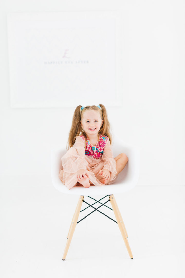 Eva Amurri Martino's daughter Marlowe sits in chair in her mom's studio