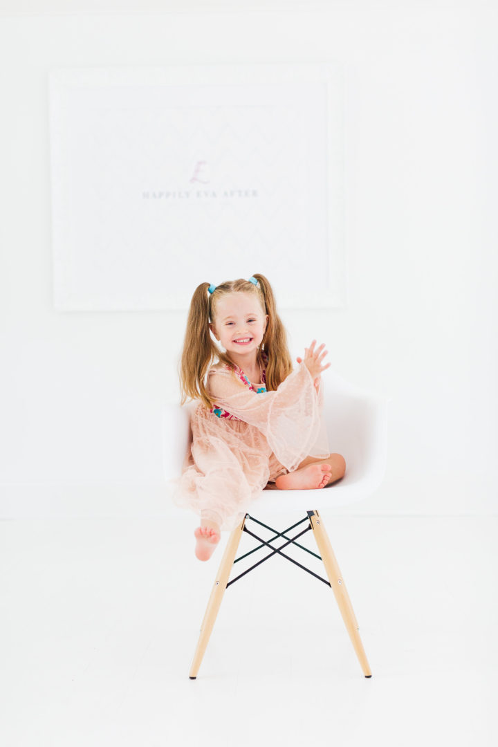 Eva Amurri Martino's daughter Marlowe sits in chair in her mom's studio