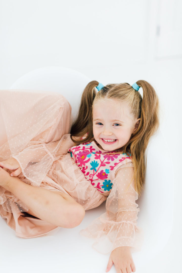 Eva Amurri Martino's daughter Marlowe sits in chair in her mom's studio