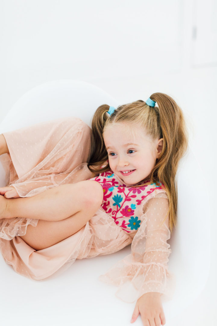 Eva Amurri Martino's daughter Marlowe sits in chair in her mom's studio