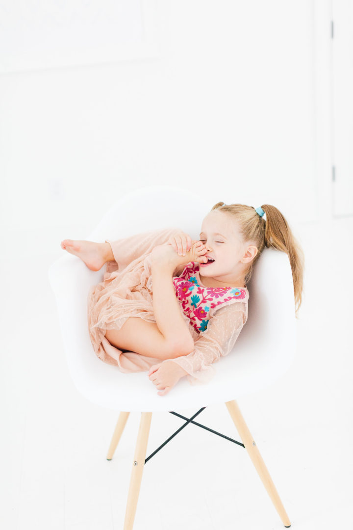 Eva Amurri Martino's daughter Marlowe sits in chair in her mom's studio