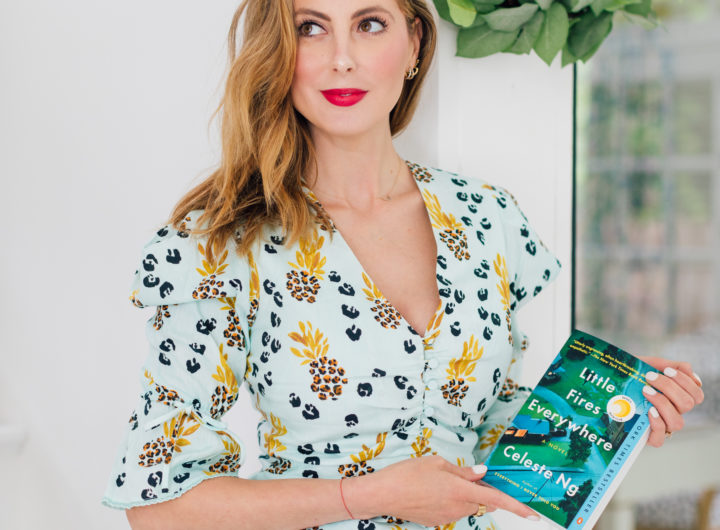 Eva Amurri Martino wears a matching Jonathan Simkhai top and shorts while holding her third HEA Book Club pick: Little Fires Everywhere by Celeste Ng