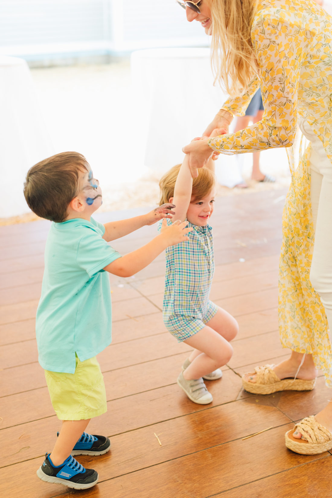 Major Martino dances with The Girl Guide Blogger Stephanie Trotta and son Harry at sister Marlowe's Cinco de Marlowe themed 5th birthday fiesta