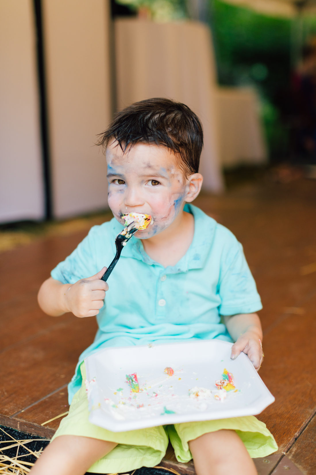 Major Martino enjoys birthday cake at his sister Marlowe's Cinco de Marlowe themed 5th birthday fiesta