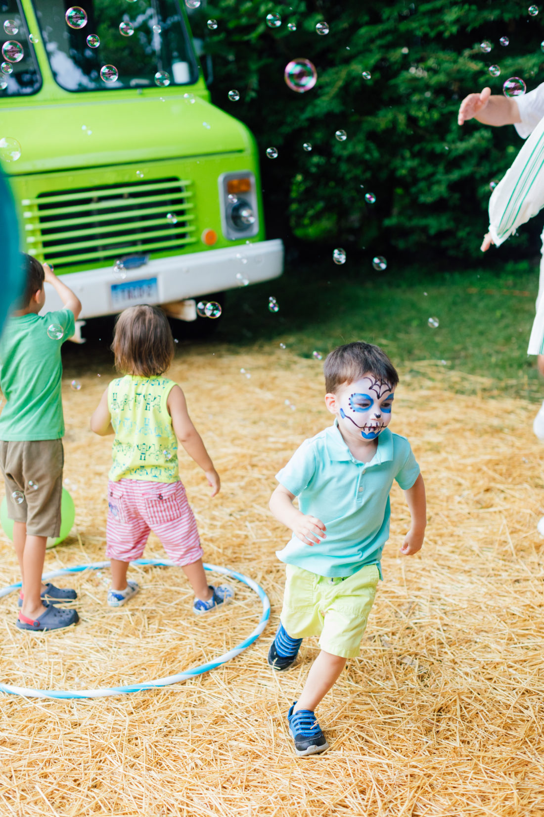 Major Martino runs around the bubbles at sister Marlowe's Cinco de Marlowe themed 5th birthday fiesta