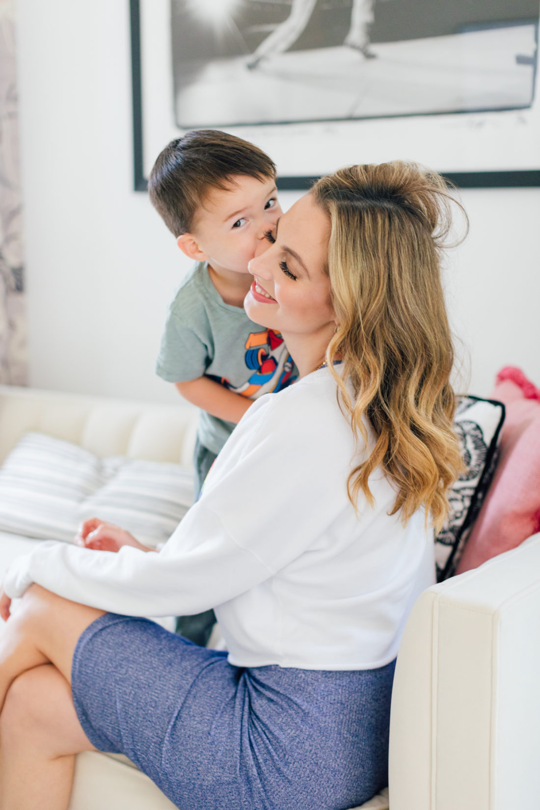 Eva Amurri Martino plays with son Major in a rainbow sweatshirt showing off her easy pretty curls