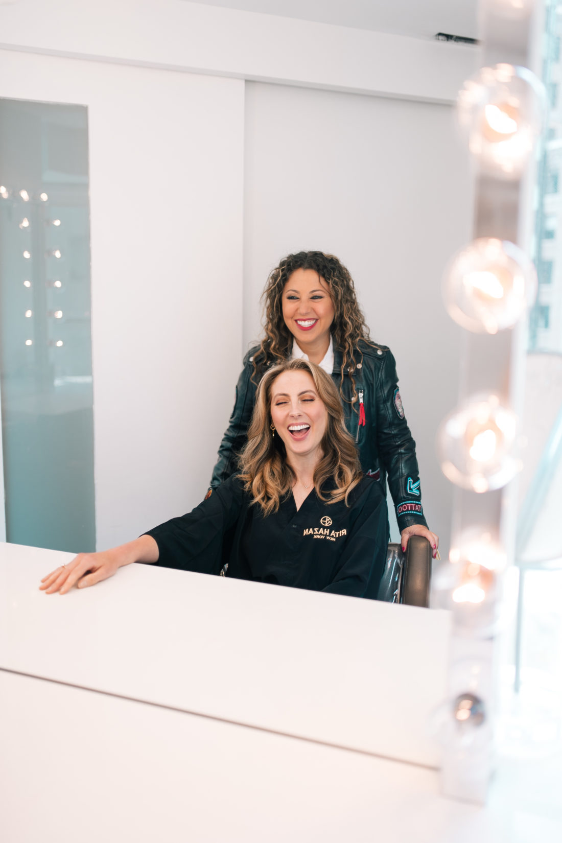 Rita Hazan plays with client Eva Amurri Martino's hair at her salon in New York City