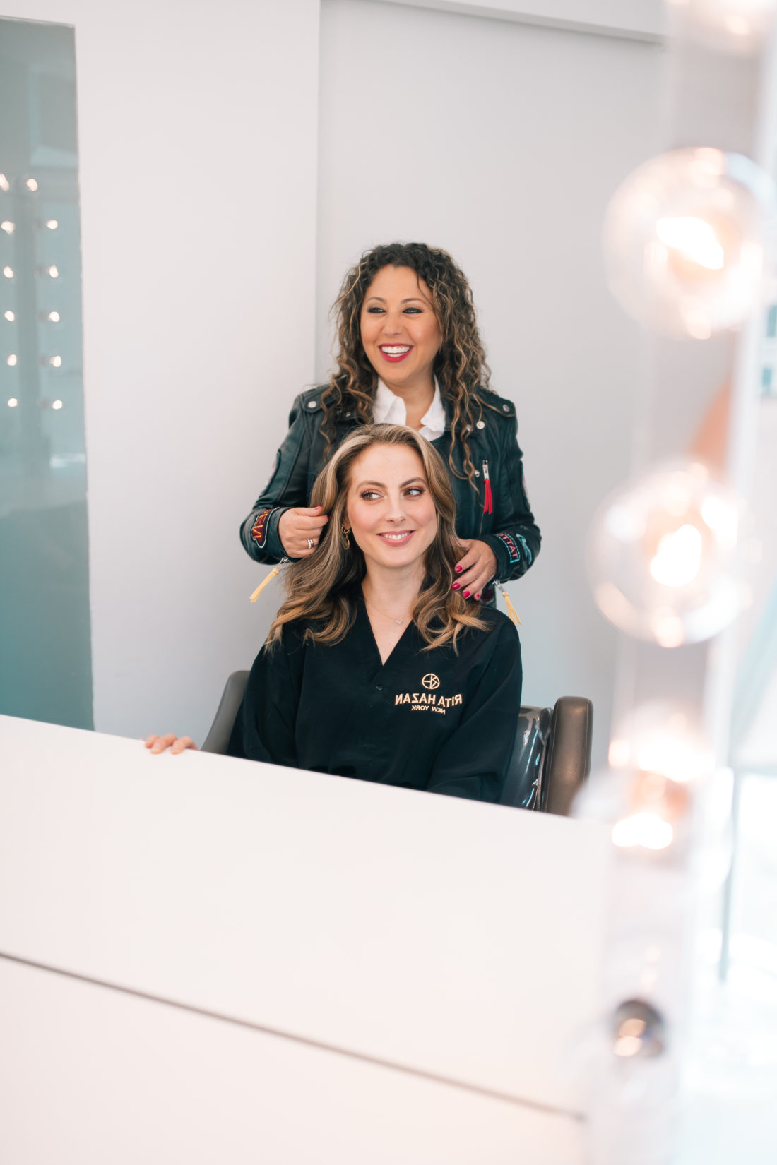 Rita Hazan plays with client Eva Amurri Martino's hair at her salon in New York City