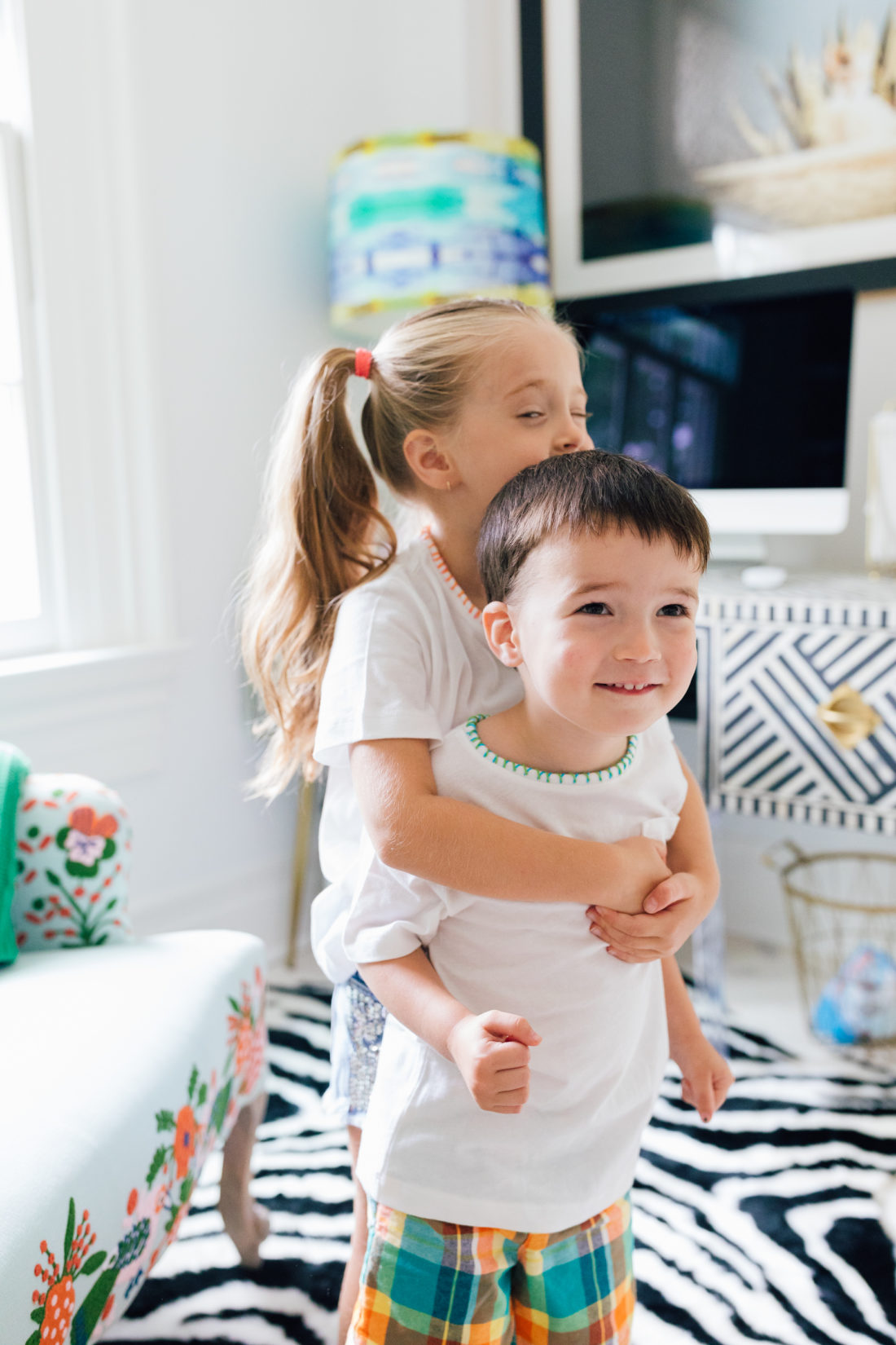 Marlowe and Major Martino hug in their embroidered tees made by mom Eva Amurri Martino