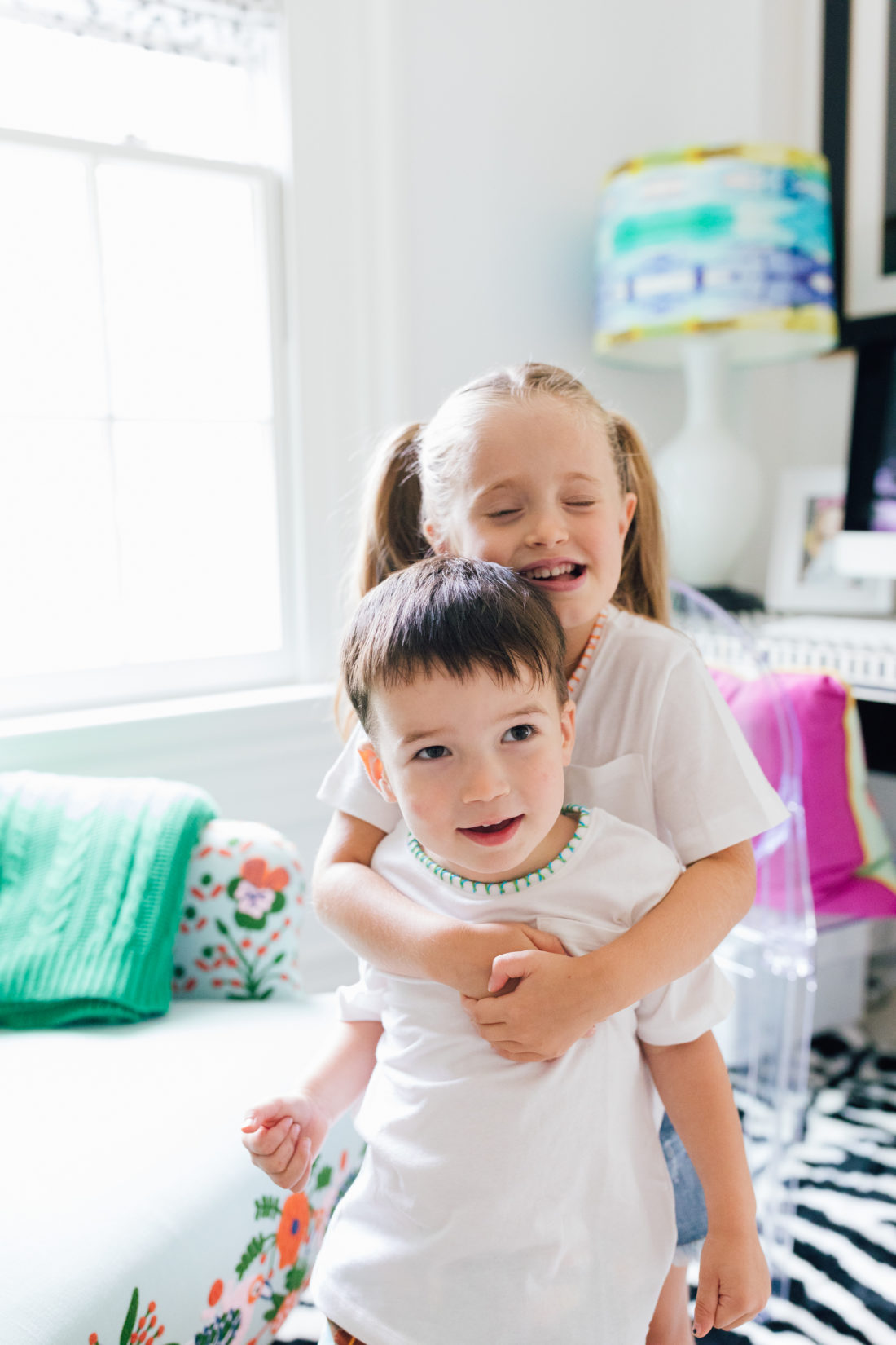 Marlowe and Major Martino hug in their embroidered tees made by mom Eva Amurri Martino