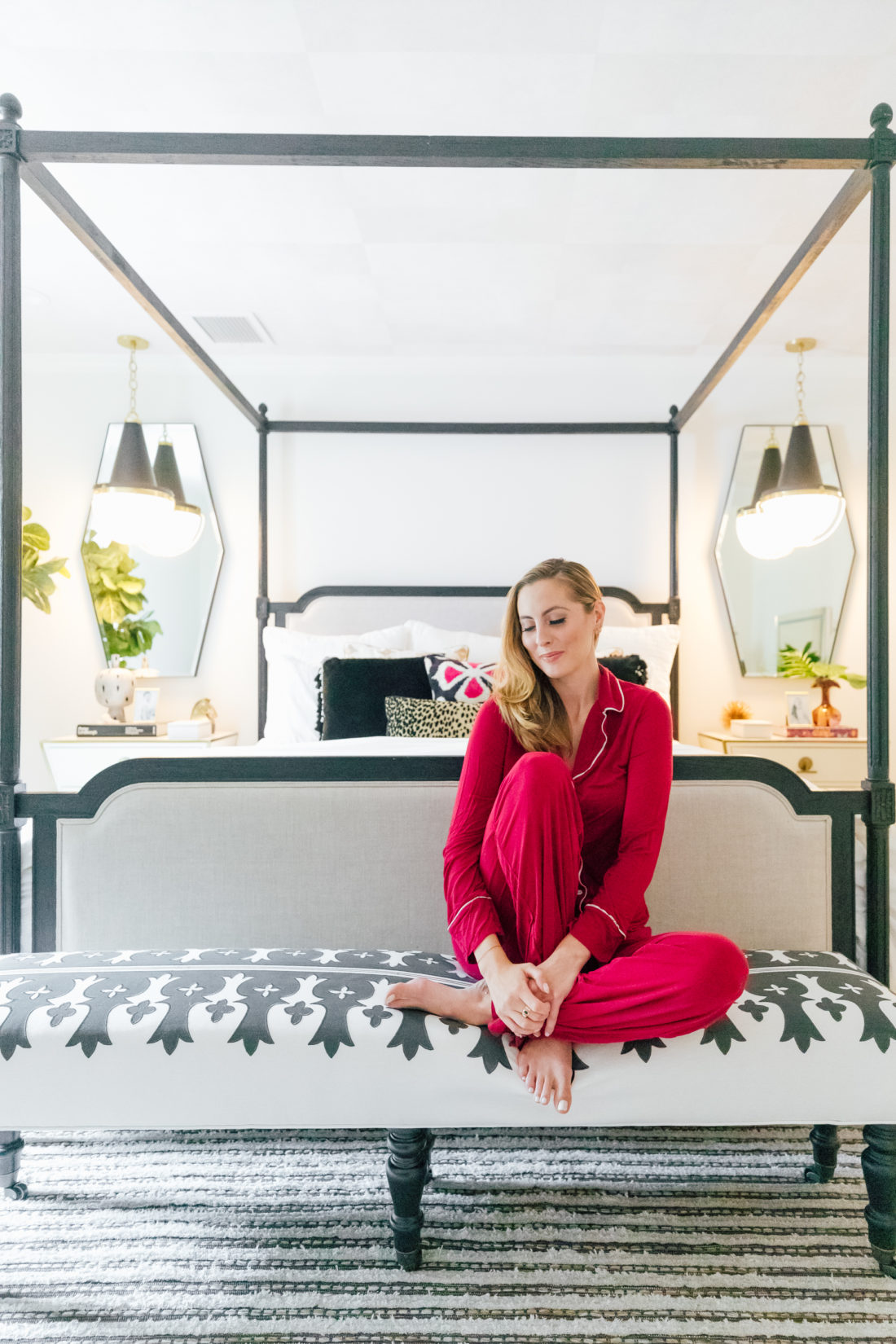 Eva Amurri Martino wears red pajamas while sitting inside her new master bedroom