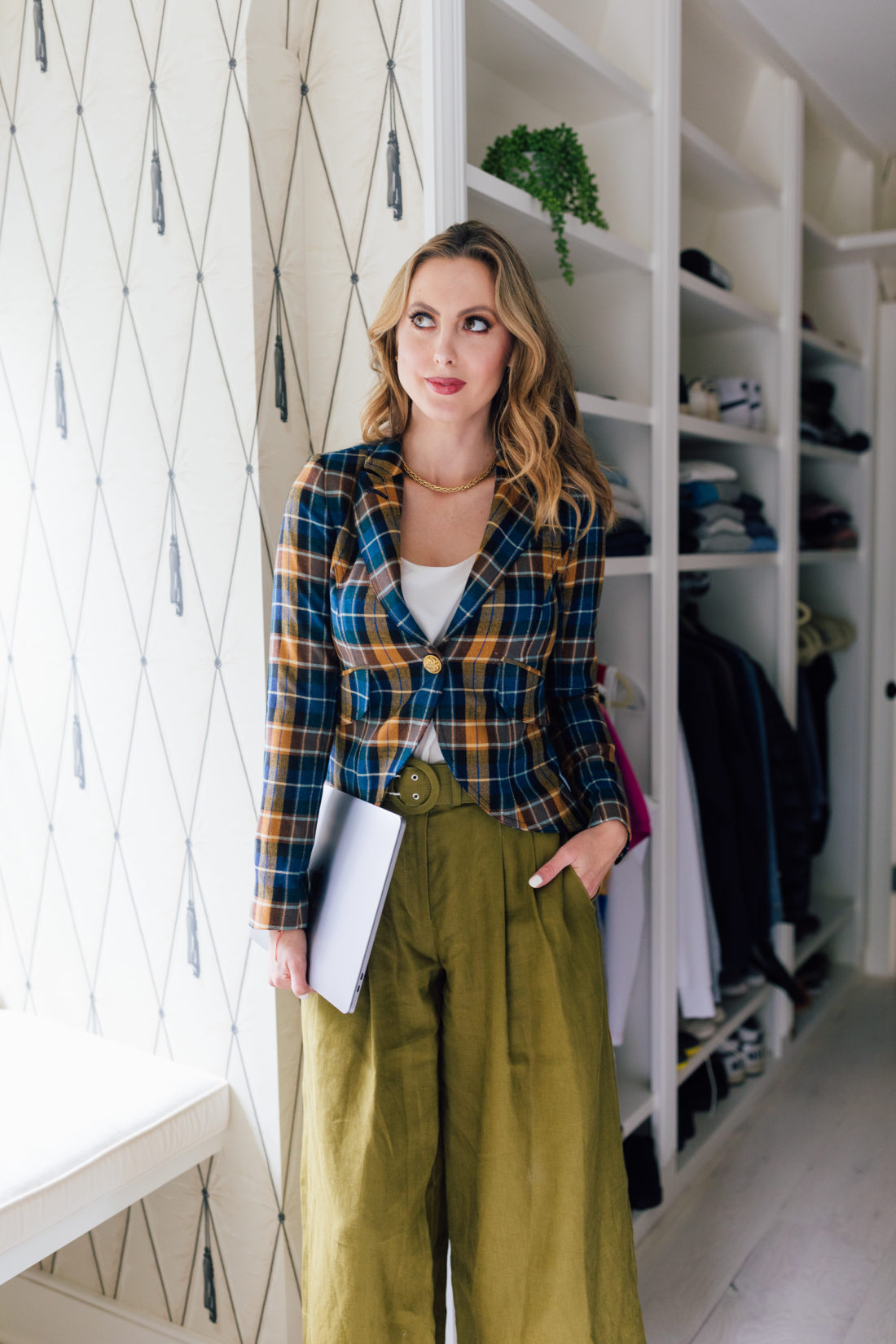 Eva Amurri Martino wears a fall blazer in her walk-in closet