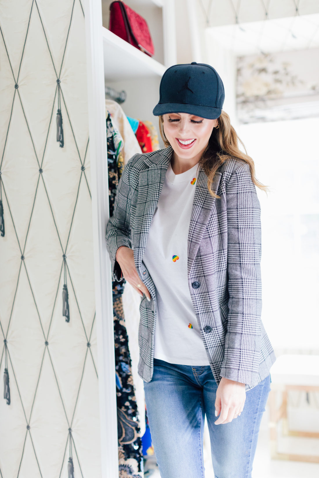 Eva Amurri Martino wears a fall blazer in her walk-in closet