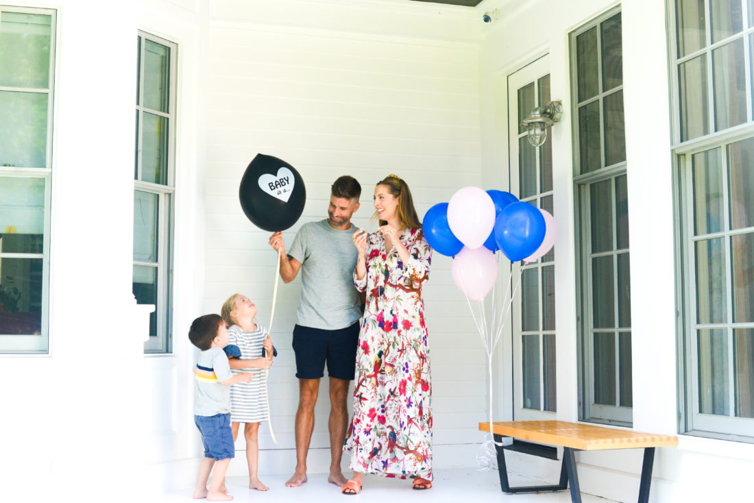 Eva Amurri Martino and husband Kyle hold a balloon with the gender of their third child
