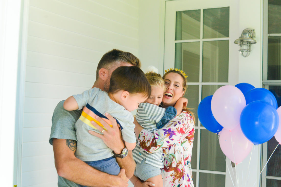 The Martino family embraces after finding out the gender of their third baby