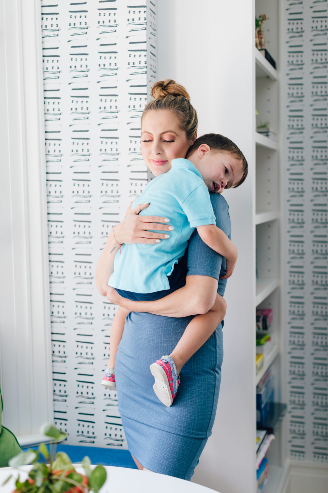 Pregnant Eva Amurri Martino hugs her son Major after surprising her kids with her third pregnancy