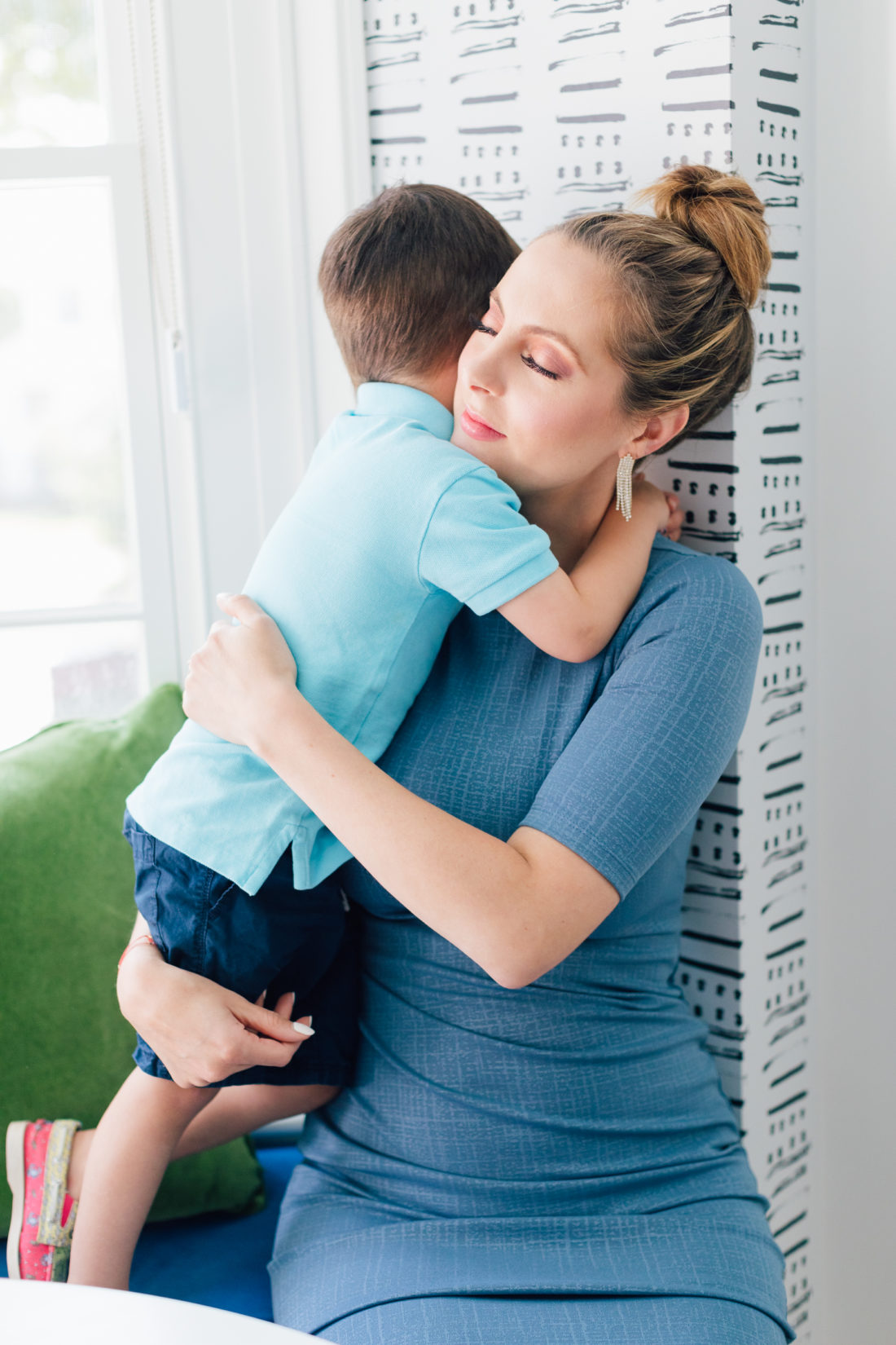 Pregnant Eva Amurri Martino hugs her son Major after surprising her kids with her third pregnancy