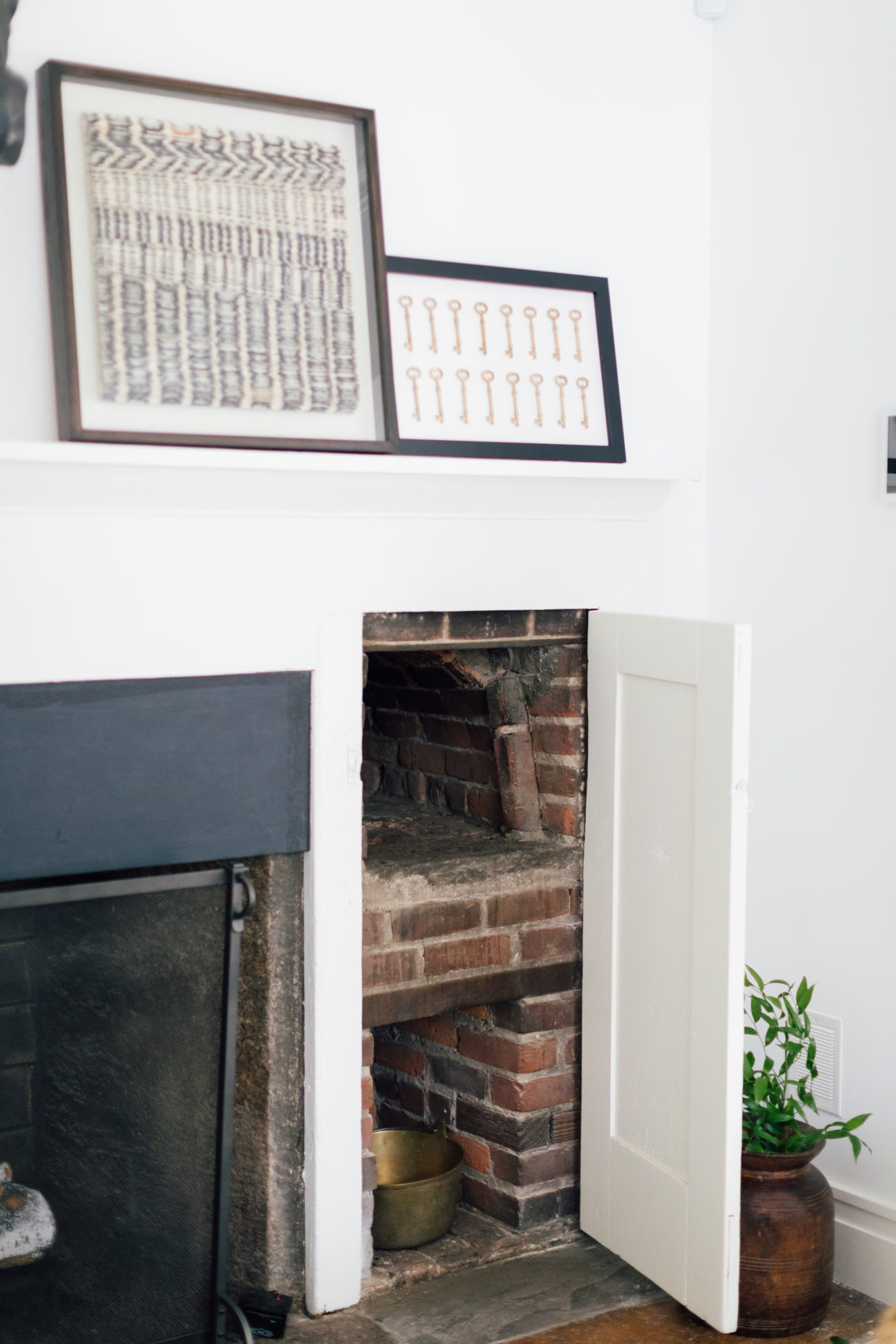 The fireplace and original wood oven are both on display in Eva Amurri Martino's renovated Connecticut kitchen