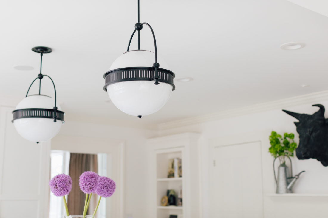 A detail shot of the light fixtures over the island in Eva Amurri Martino's renovated Connecticut home