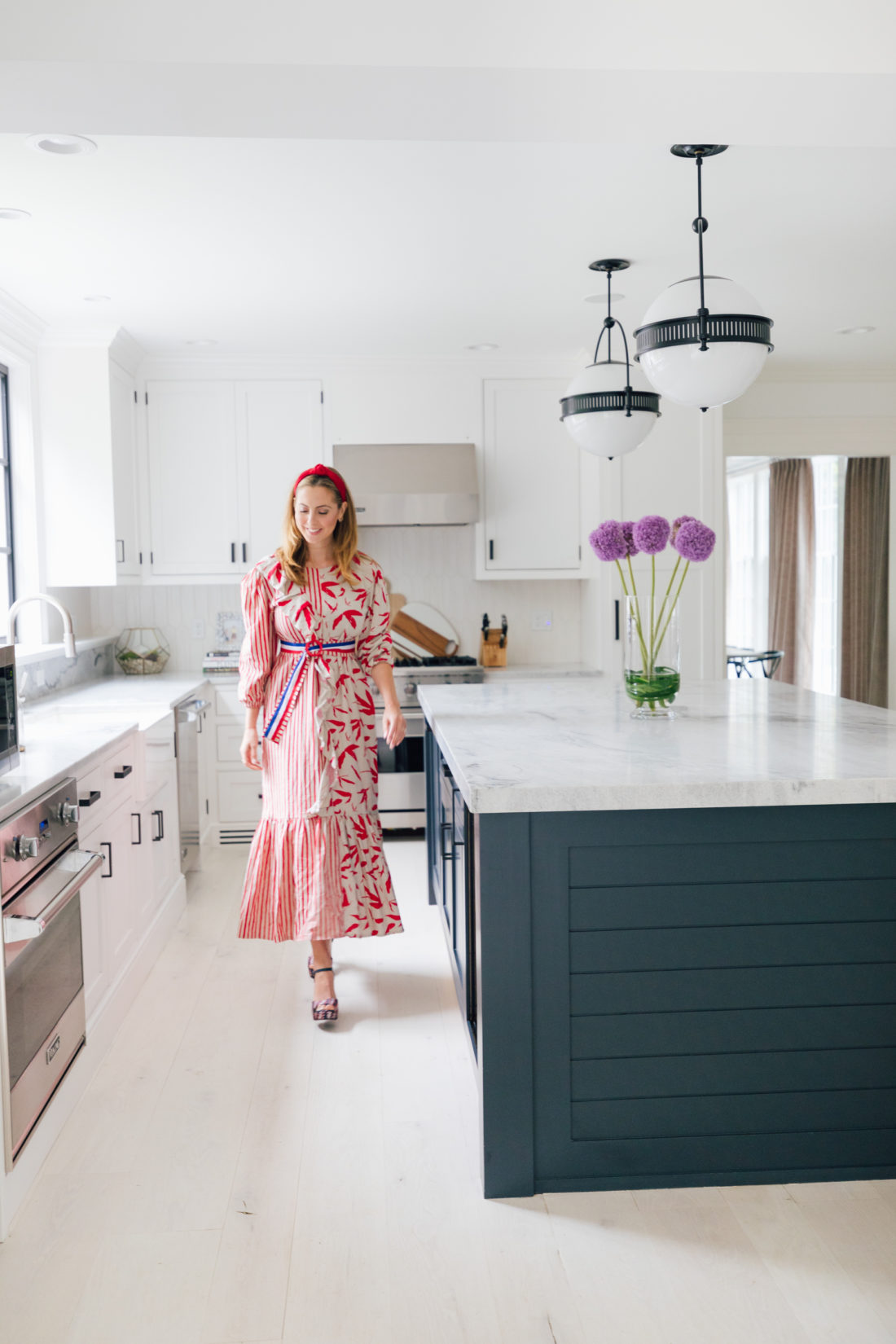 Eva Amurri Martino walks in the kitchen of her renovated Connecticut home