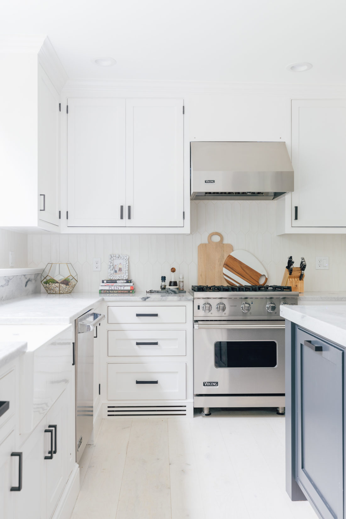 Eva Amurri Martino's renovated historical home features a white and bright kitchen with top of the line appliances and a large center island