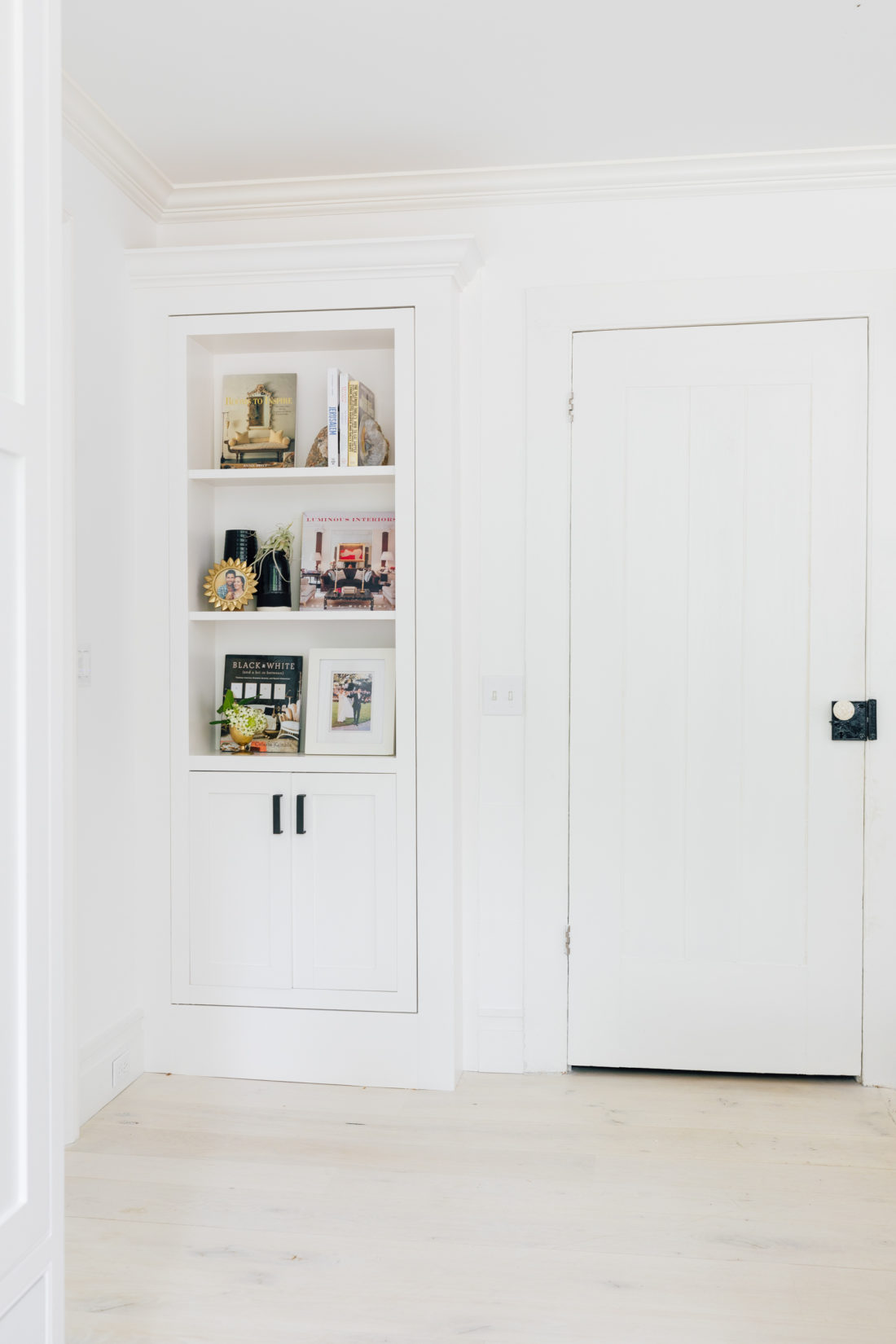 A styled bookshelf in Eva Amurri Martino's renovated Connecticut kitchen