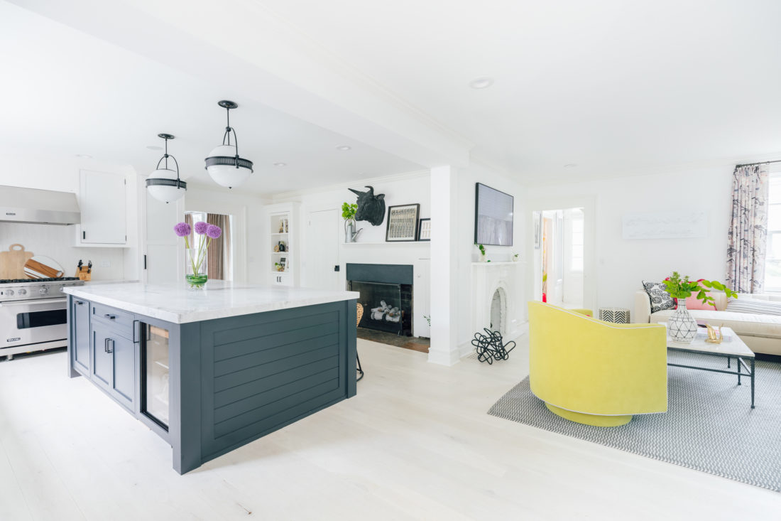 A wide view of Eva Amurri Martino's renovated Connecticut kitchen shows the open plan and the modern and bright style