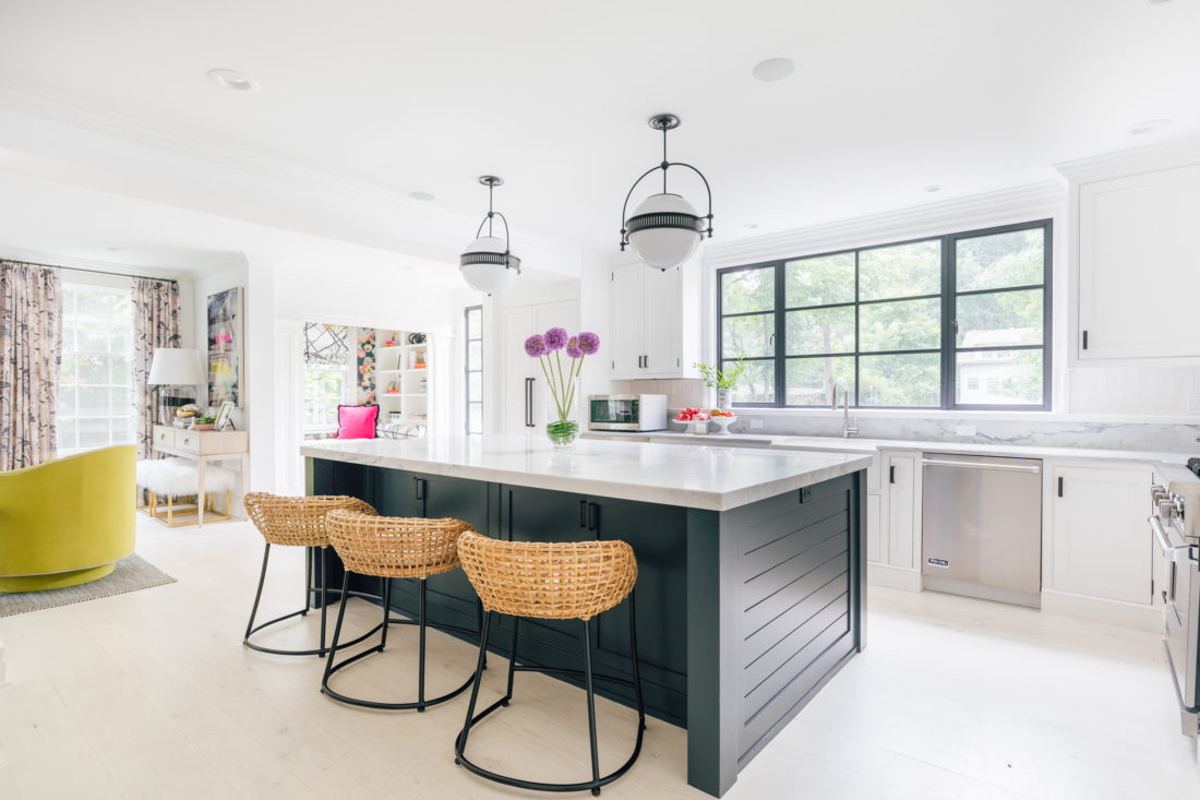 Eva Amurri Martino shares a wide view of the open plan, renovated, white and bright kitchen in her historic Connecticut home