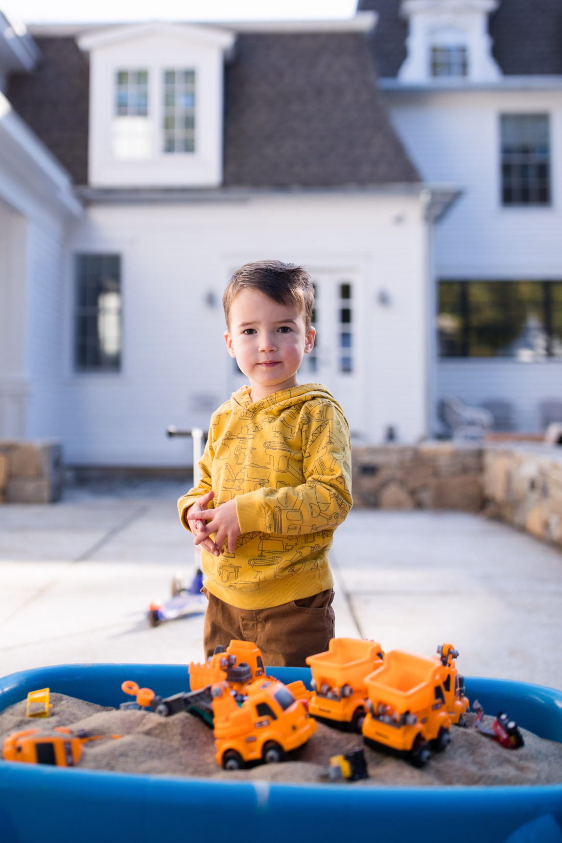 Major Martino plays in the sand table at his 3rd birthday party