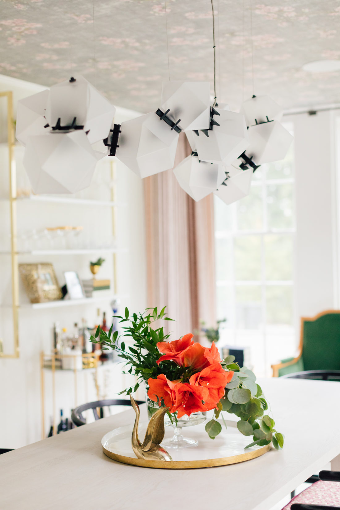 A closeup of the custom Gabriel Scott Chandelier in Eva Amurri Martino's newly renovated dining room