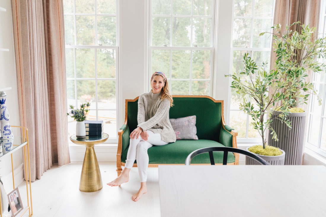 Eva Amurri Martino sits on her custom Taylor Burke settee in her newly renovated dining room