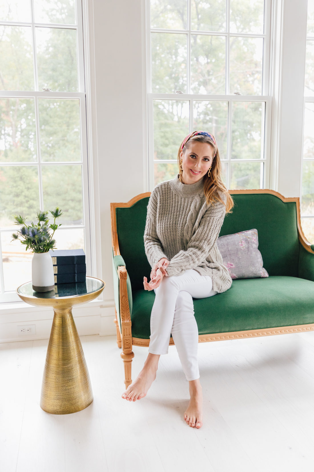 Eva Amurri Martino sits on her custom Taylor Burke settee in her newly renovated dining room
